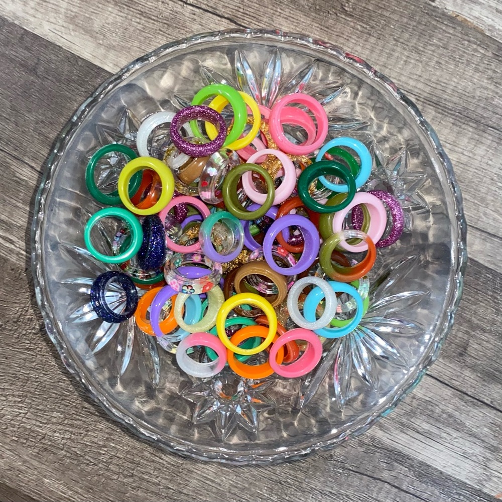 TWO surprise resin rings